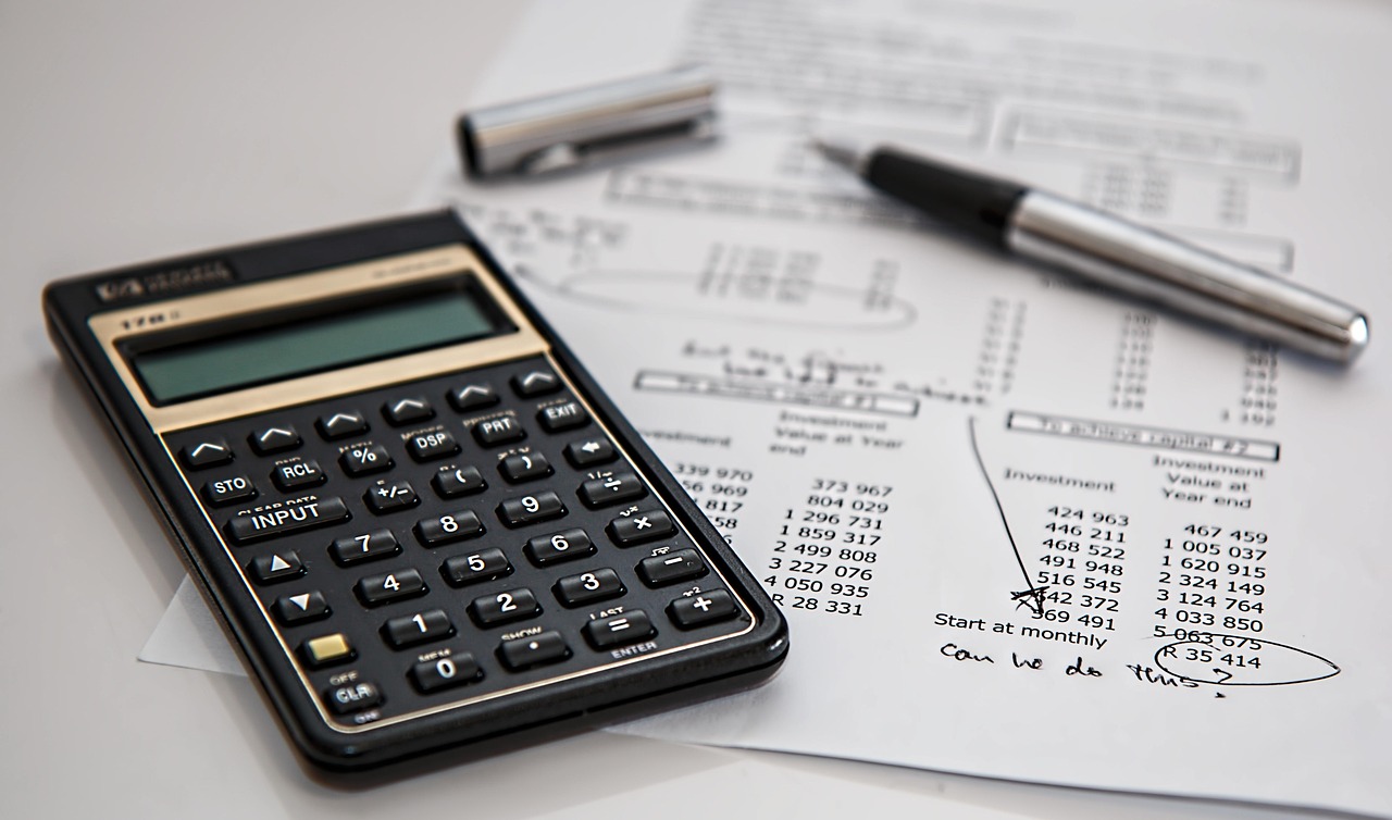 mortgage calculator paperwork desk